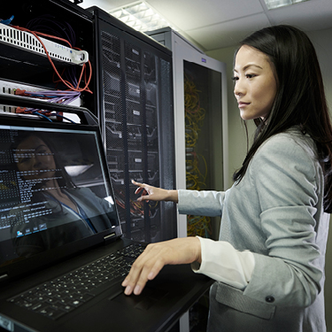 Image of woman working on computer network